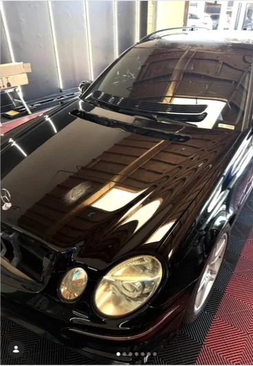 Black vehicle with a glossy finished exterior